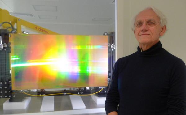 Prof. Gérard Mourou and one of his initial diffraction gratings