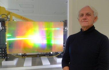 Prof. Gérard Mourou and one of his initial diffraction gratings Prof. Gérard Mourou and one of his initial diffraction gratings