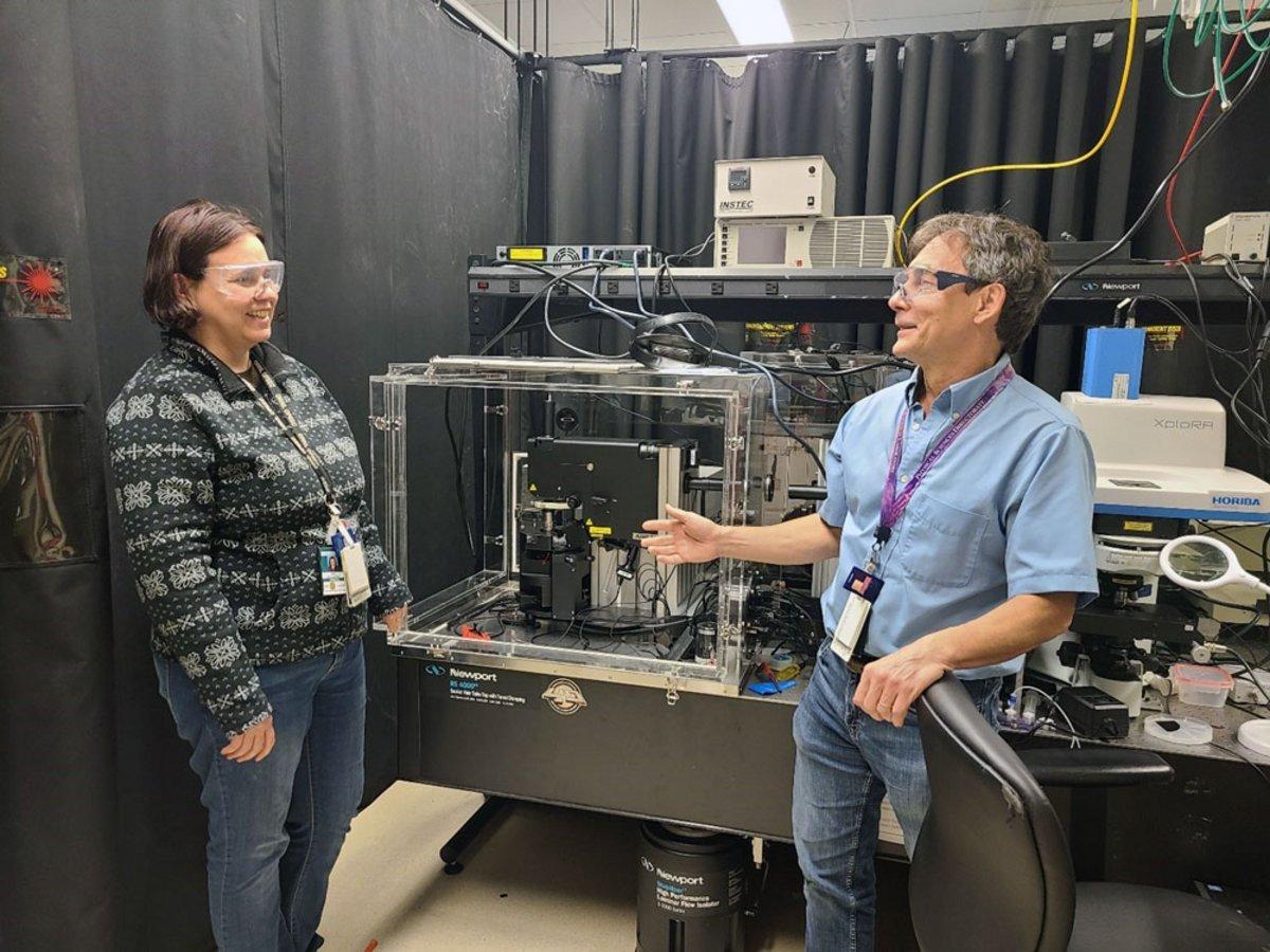Dr. Bocharova (left) and Dr. Sokolov (right) discussing the next TERS experiments in front of the AFM-Raman system from HORIBA Scientific.