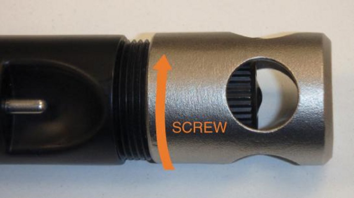 image of screwing the stainless steel protective guard into the DO electrode body 